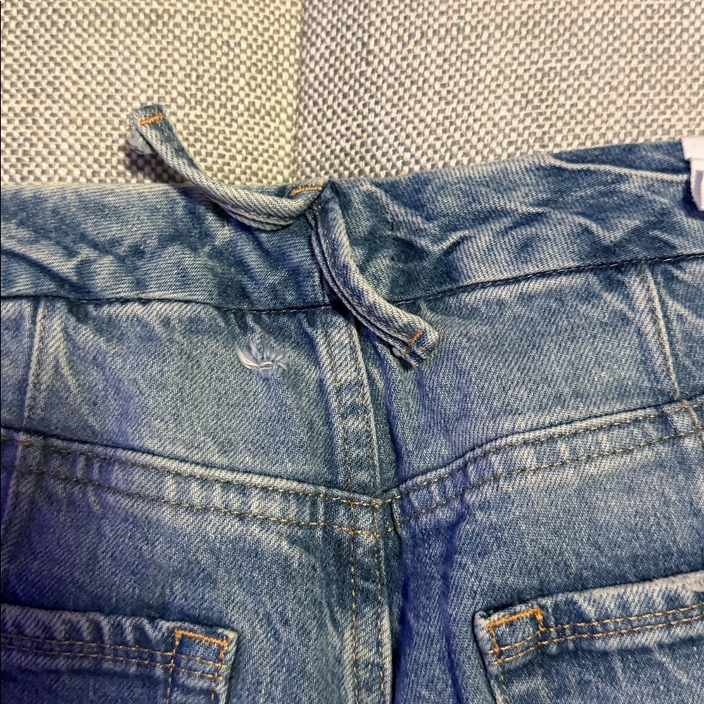 Good American High Rise Light Blue Distressed Jeans - Picture 4 of 9